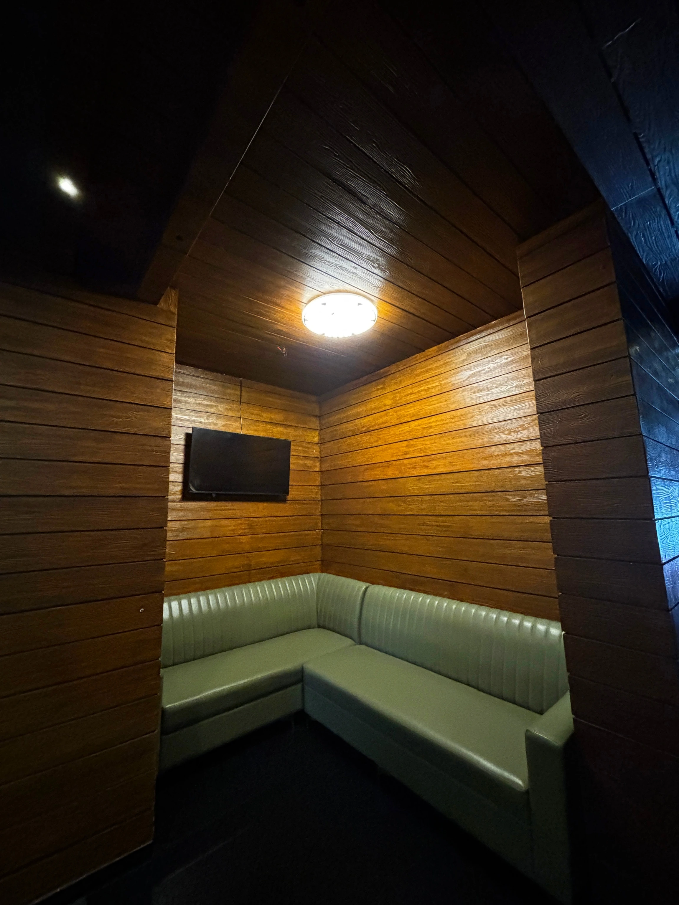 Cozy Green Corner Booth Seating