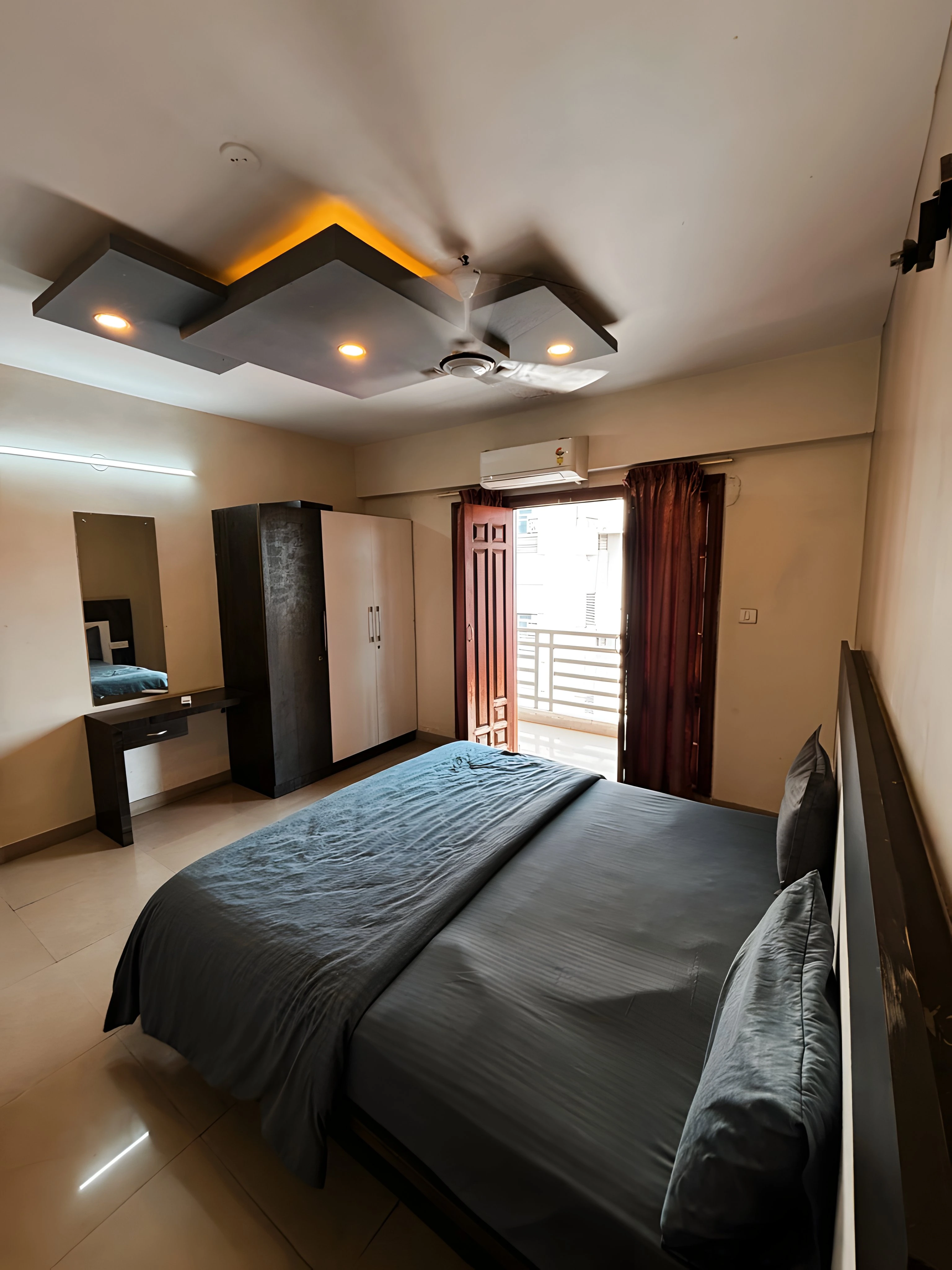 Modern bedroom withdark bed and balcony